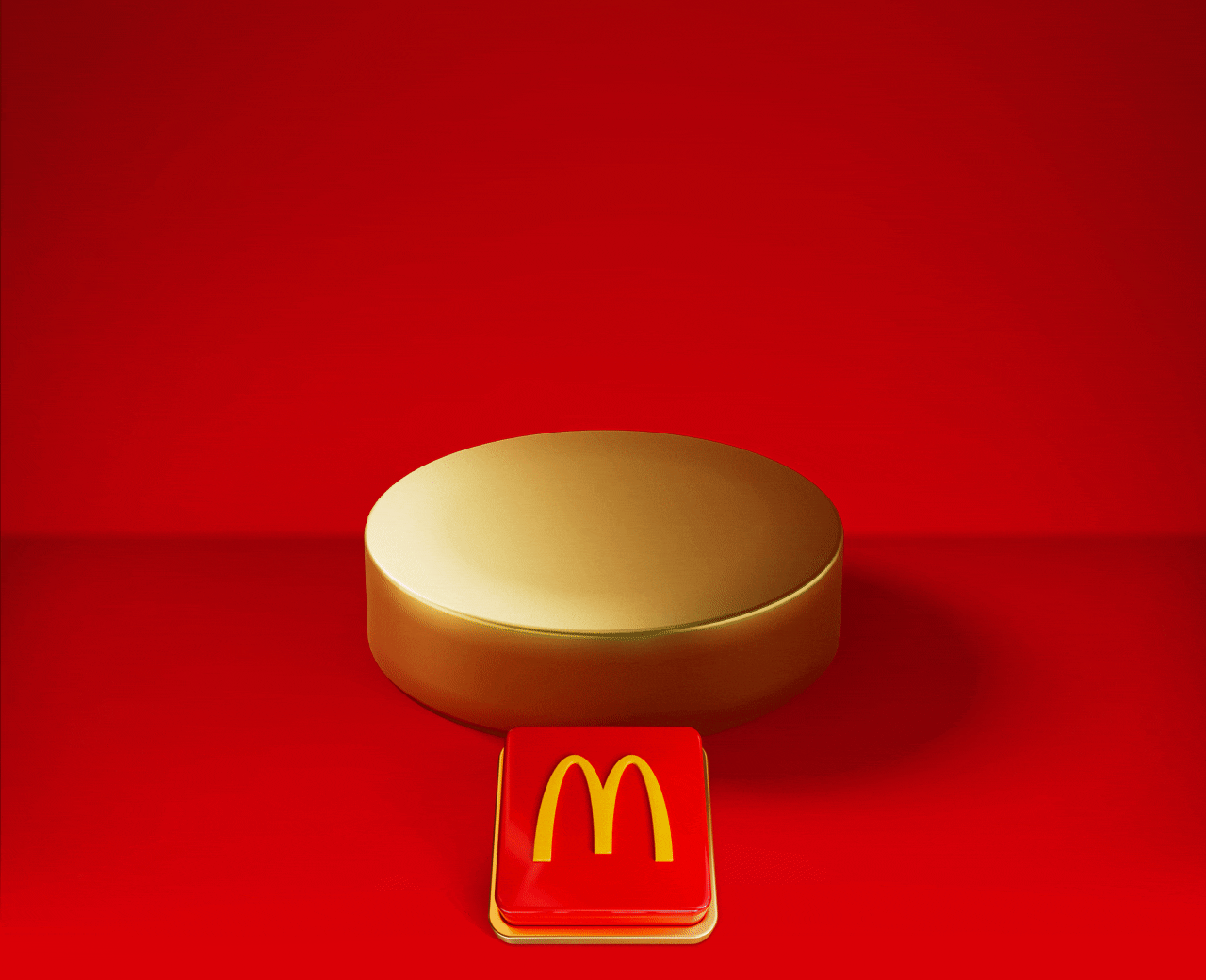An empty gold plinth sits on a red background with a big red button beneath it. Text reads PUSH THE BUTTON TO REVEAL YOUR