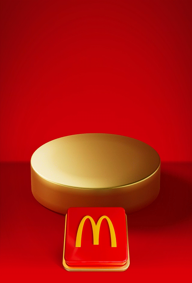 An empty gold plinth sits on a red background with a big red button beneath it. Text reads PUSH THE BUTTON TO REVEAL TOMORROW'S OFFER