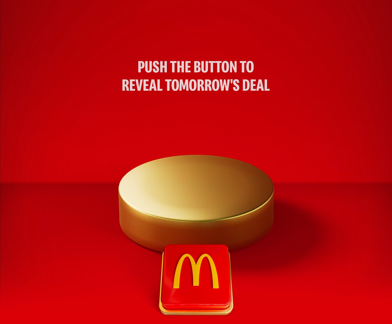 An appetising McDonald's meal sits on a gold plinth. Text reads SAVE £2 WHEN YOU SPEND £10