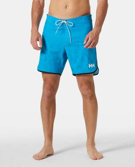 Man wearing HP Curve Board Shorts 7”