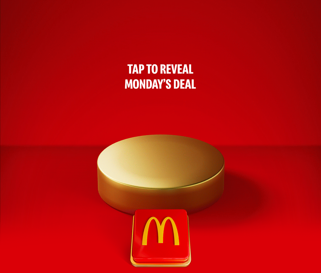 Big Mac® sits on a gold plinth on a red background. Big white text reads 50% OFF A BIG MAC®