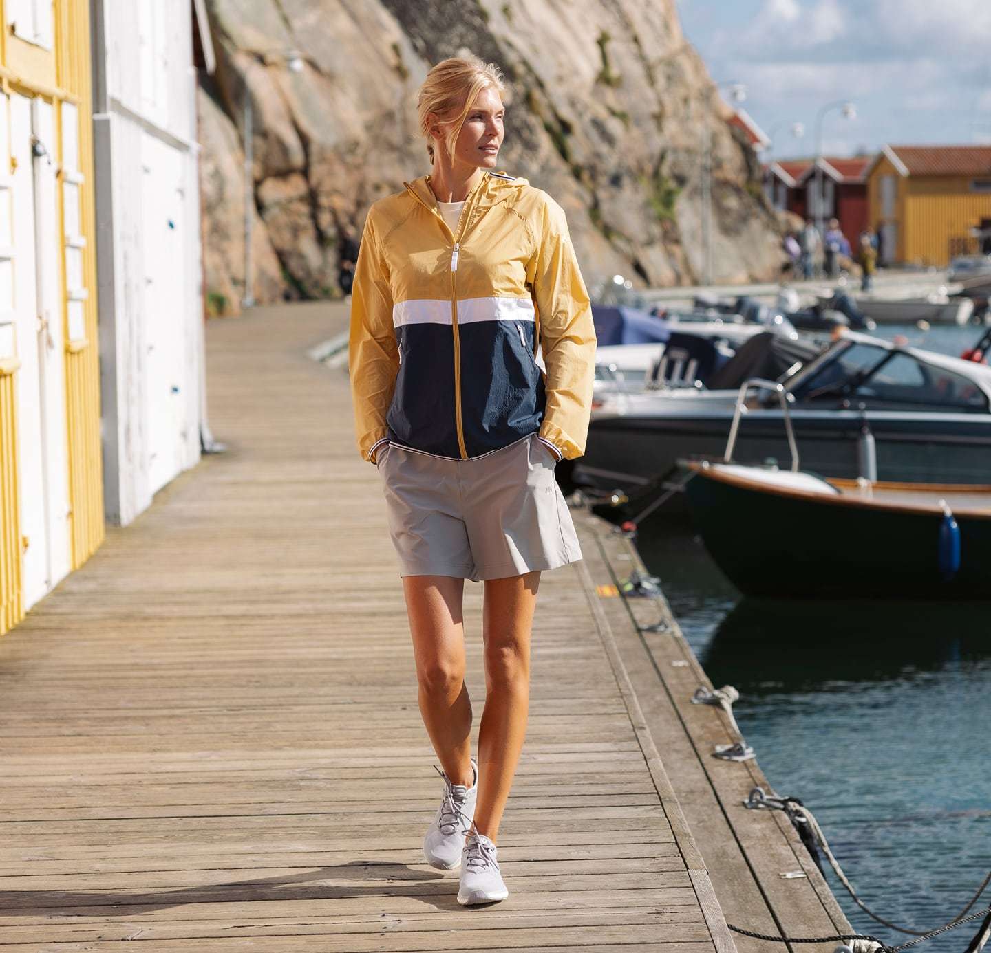 Woman wearing Helly Hansen gear on the pier