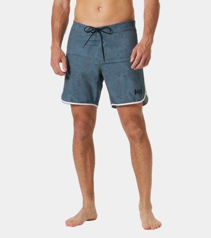 Man wearing HP Curve Board Shorts 7”