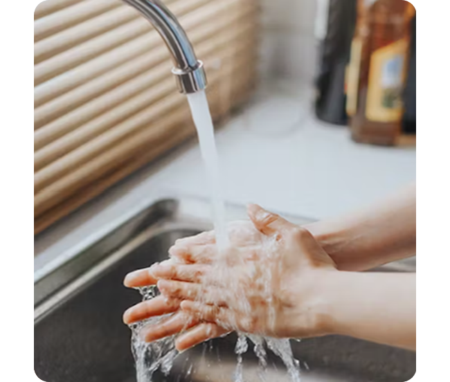 Someone washing their hands