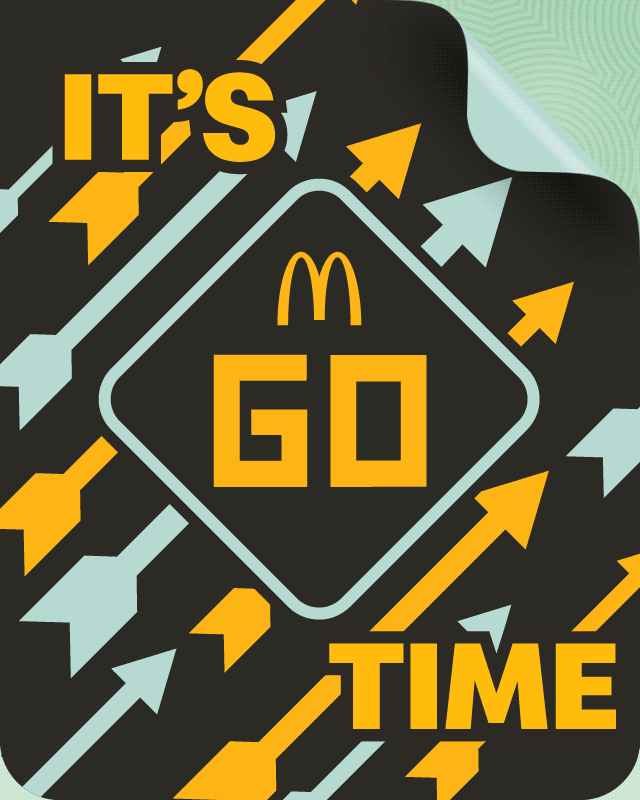 A cartoon 3D Monopoly board featuring McDonald's themes
