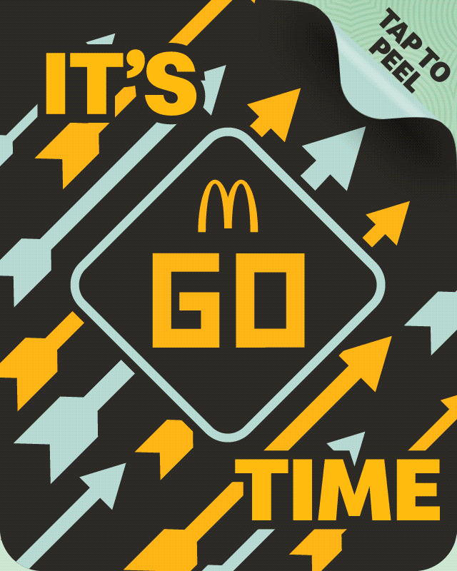 A cartoon 3D Monopoly board featuring McDonald's themes
