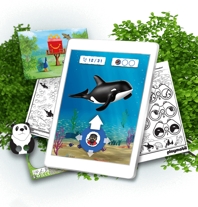 Interactive game on a tablet and playsheets in a jungle setting