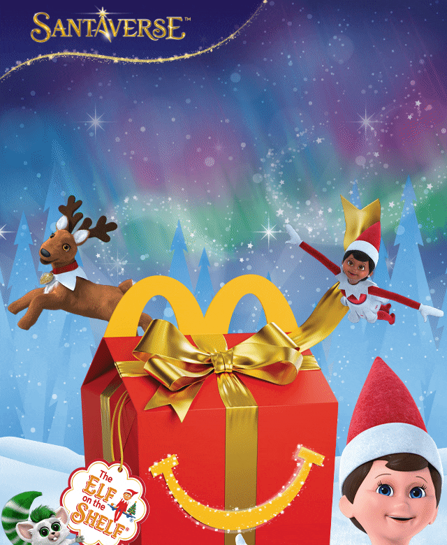 A decorative Happy Meal® box in a festive scene. White text reads 'Tell your happy little helpers The Elf on the Shelf® is here!'