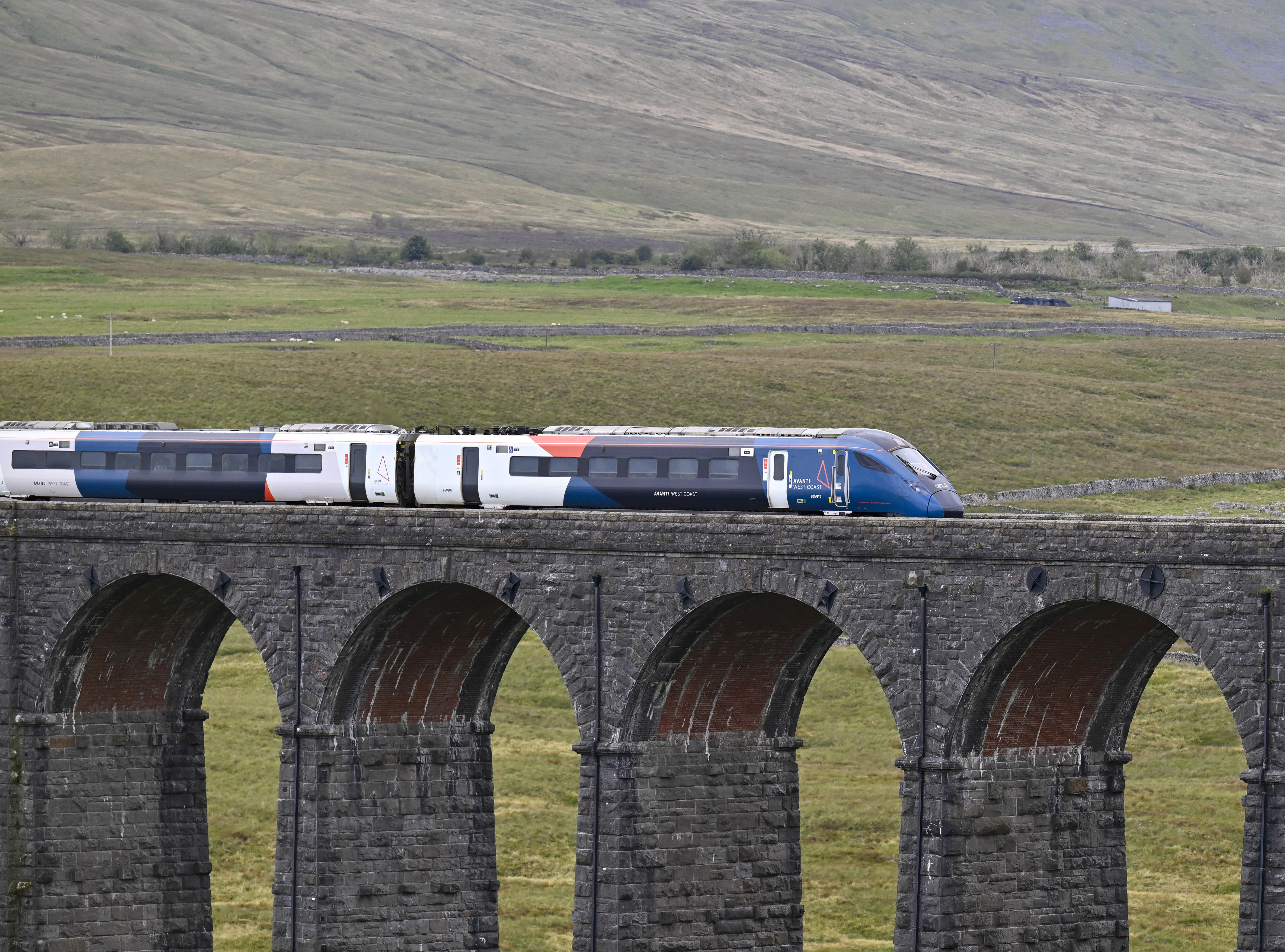 Avanti West Coast express crossing the Ribblehead Viaduct in North Yorkshire
