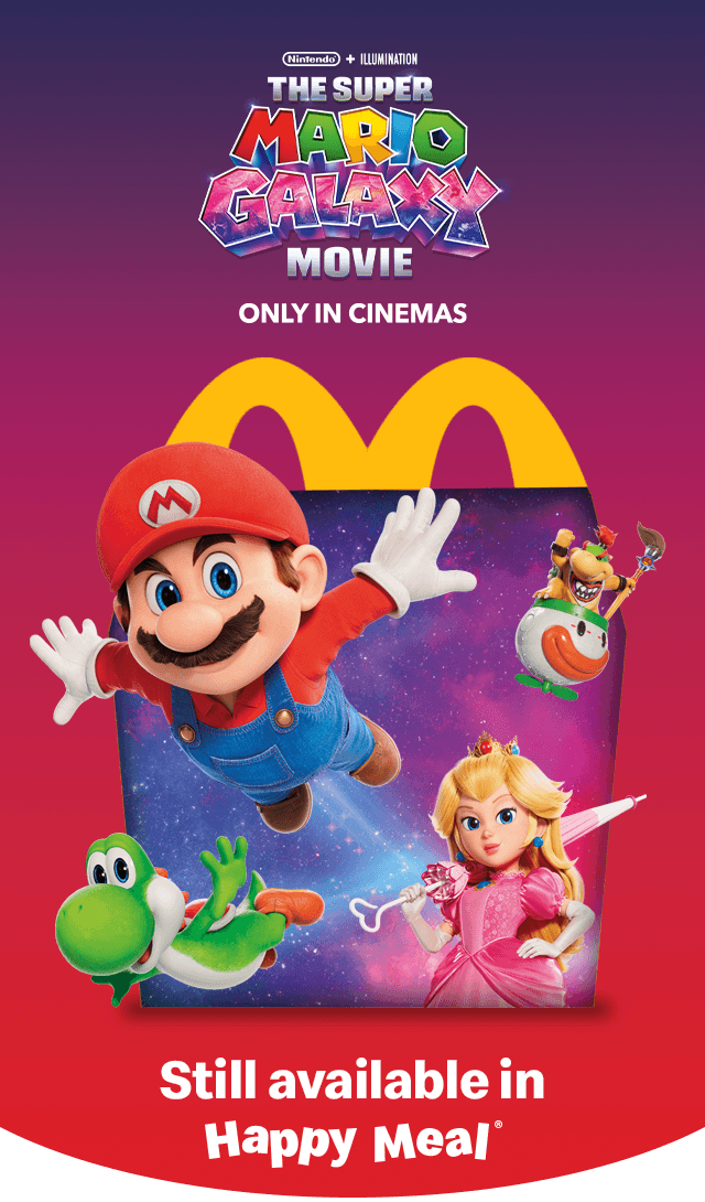 A Happy Meal® box with Super Mario characters coming out from it. Text reads 'The Super Mario Galaxy Movie - only in cinemas. Still available in Happy Meal®'.