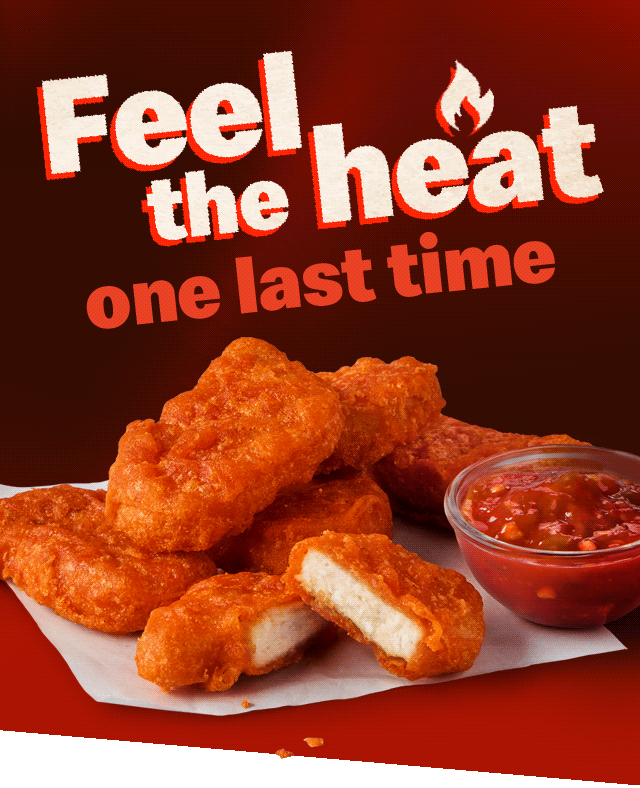 A photo of 6 Spicy McNuggets&reg;. Text on the image reads 'Feel the heat one last time'.