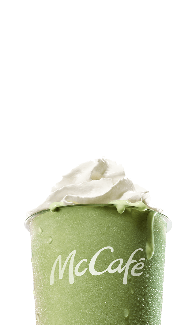 An icy, refreshing matcha latte on a blue-pink gradient background. As you scroll down the page, large white text is revealed reading 'Make it a matcha summer. Matcha blended with ice, topped with whipped cream, sweetened with vanilla'.