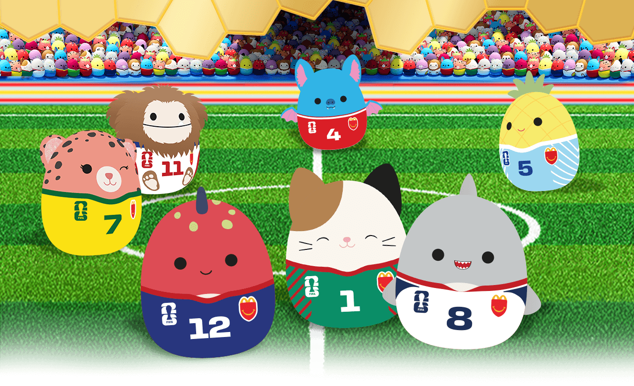 Squishmallows characters on a football pitch