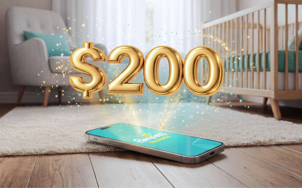 A phone with Pampers Rewards on its screen shines and sparkles as a gold “$200” appears to float above.