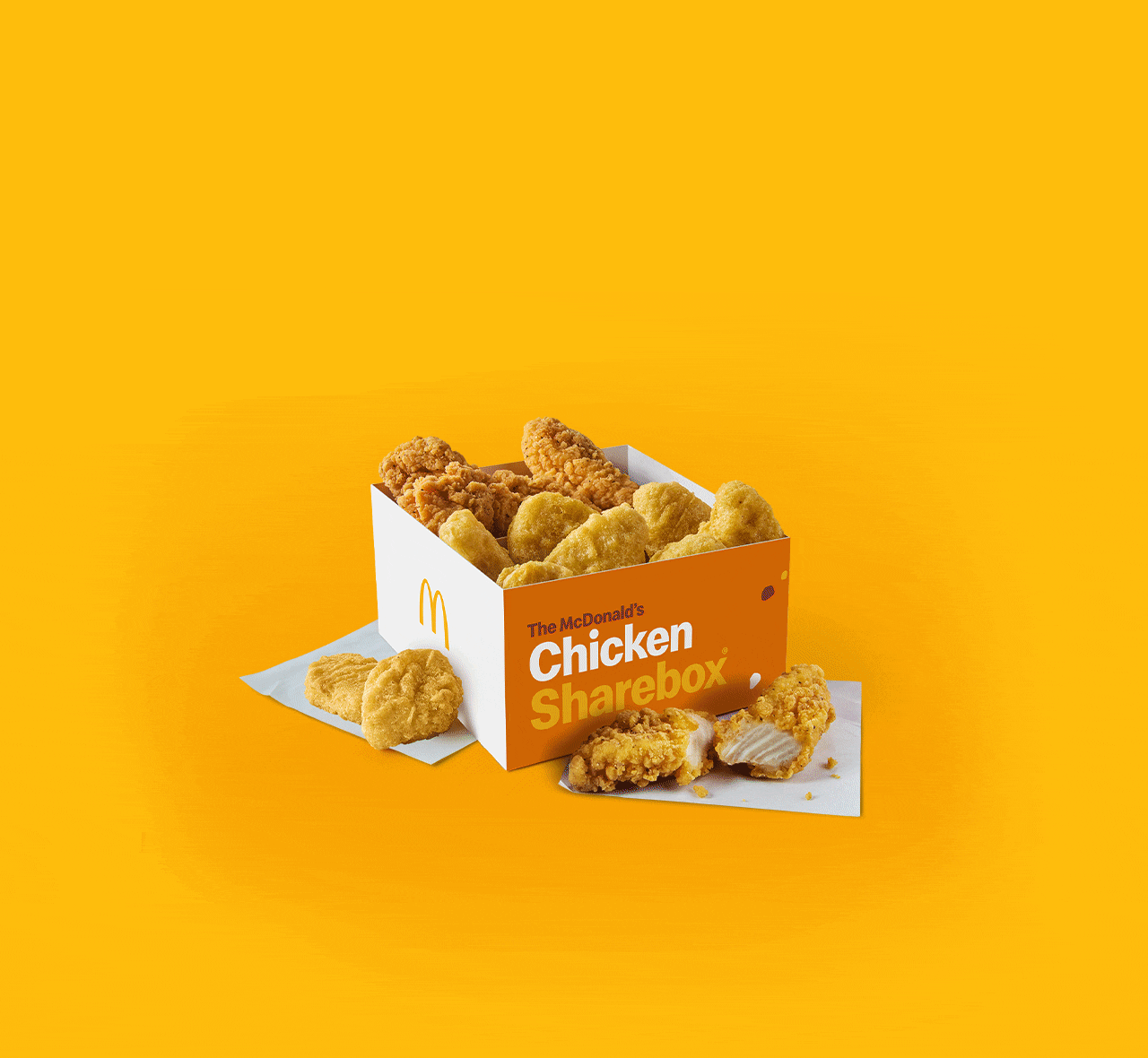 A Chicken Sharebox with a choice of 4 dips around it. Text reads 'Here for the sauce'.