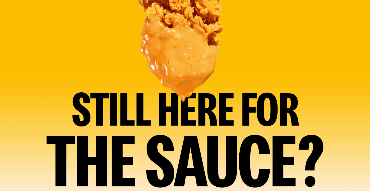 A Chicken Select coated in sauce. Text on the image asks 'Still here for the sauce?'.