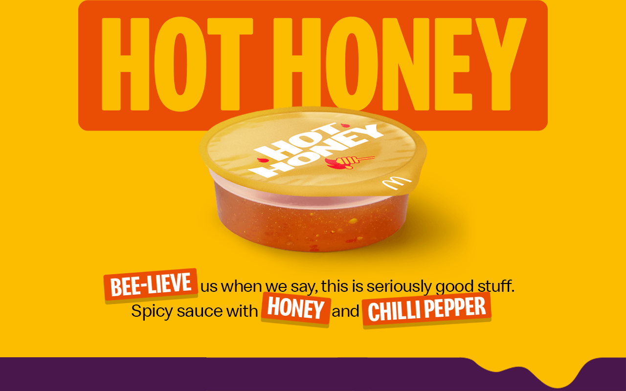 The Hot Honey dip. Text on the image reads 'Bee-lieve us when we say, this is seriously good stuff. Spicy sauce with honey and chilli pepper'.