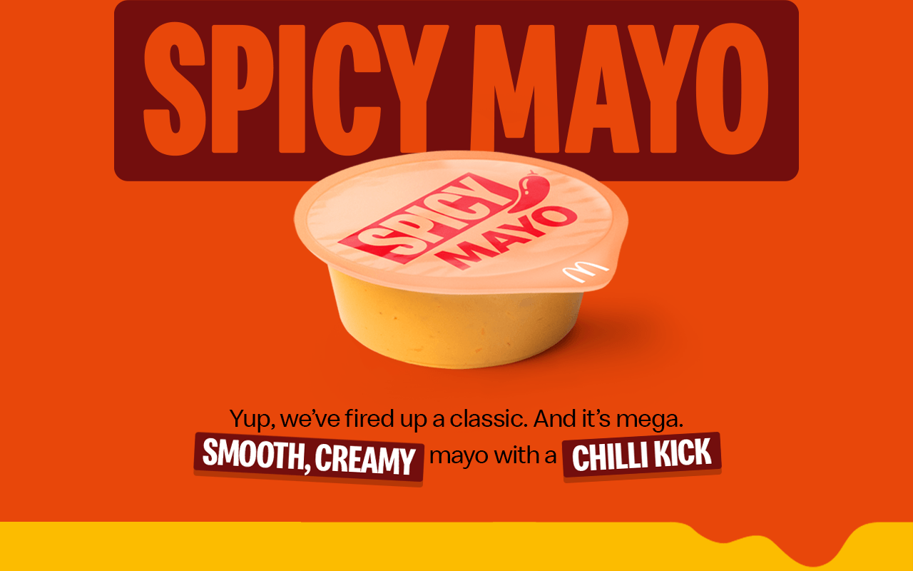 The Spicy Mayo dip. Text on the image reads 'Yup, we've fired up a classic. And it's mega. Smooth, creamy mayo with a chilli kick'.