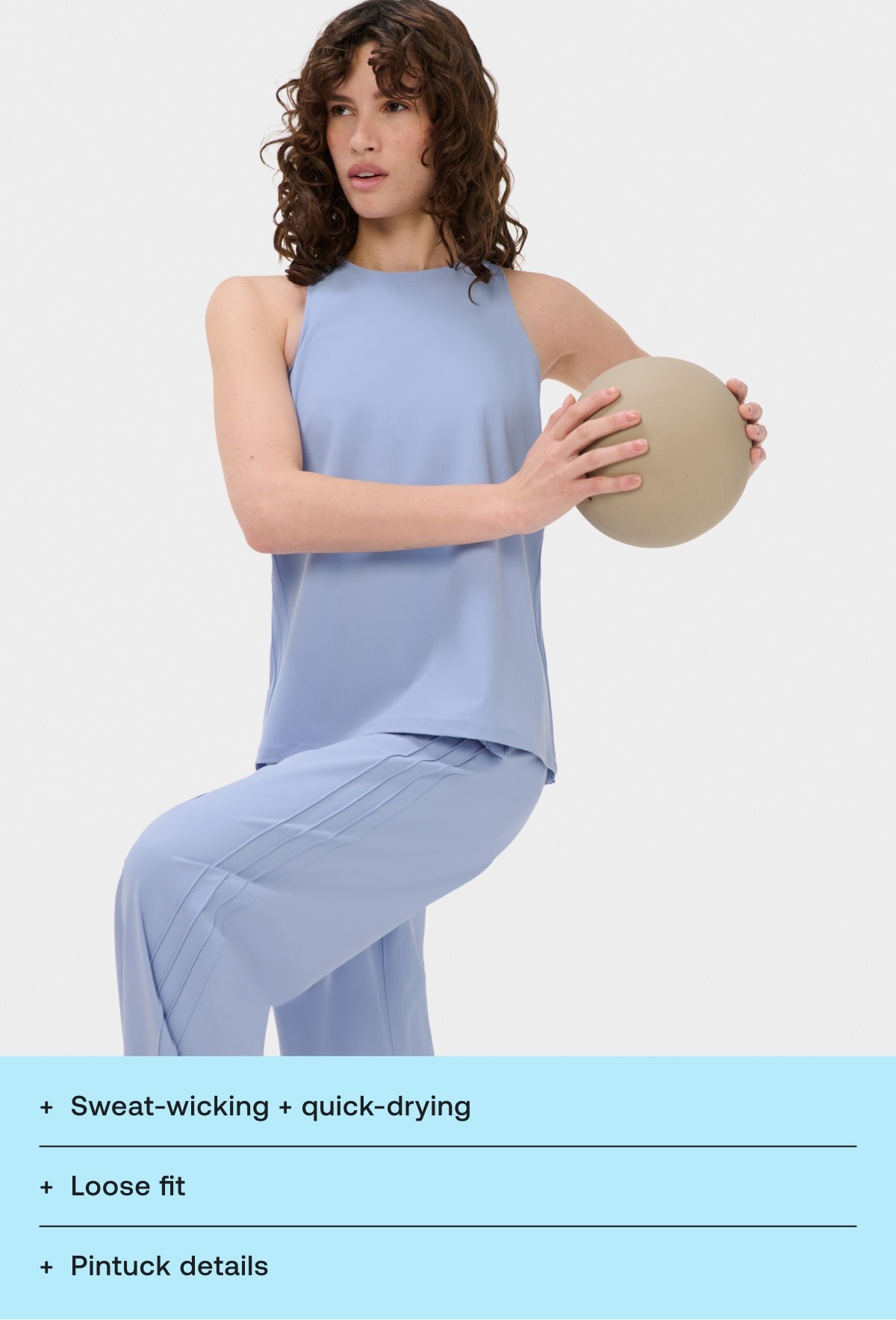 Sweat-wicking + quick-drying Loose fit Pintuck details