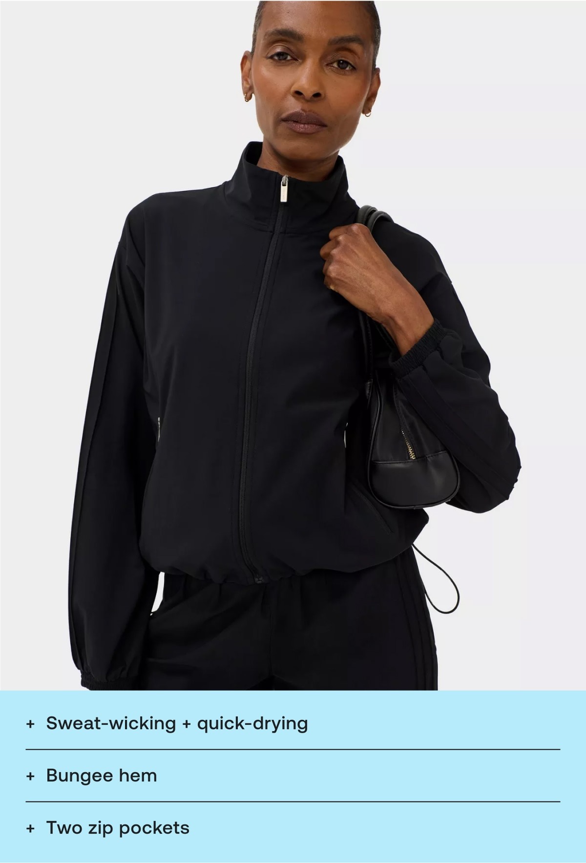 Sweat-wicking + quick-drying Bungee hem Two zip pockets