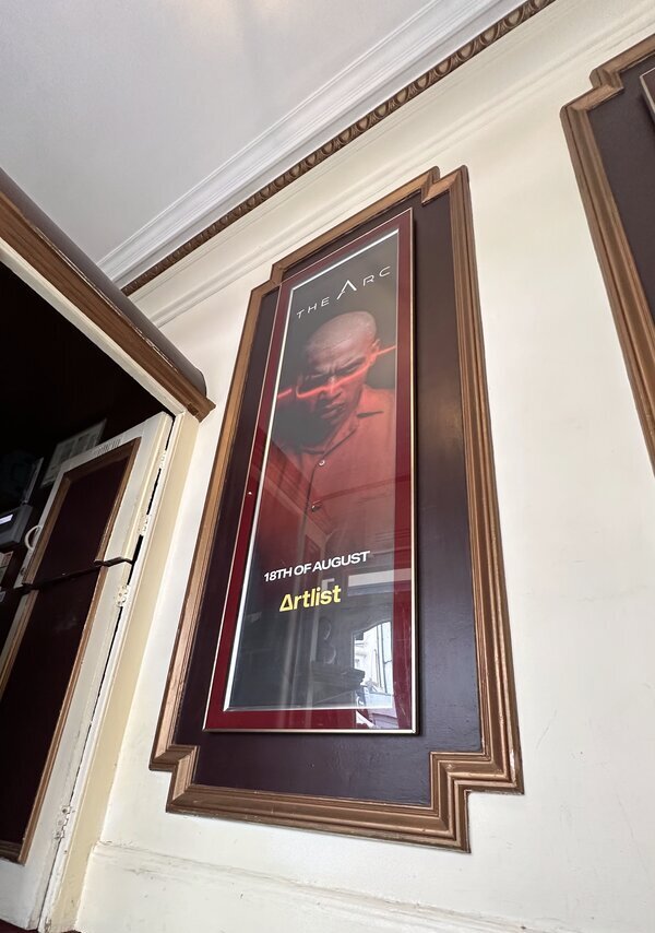 The Arc lobby poster