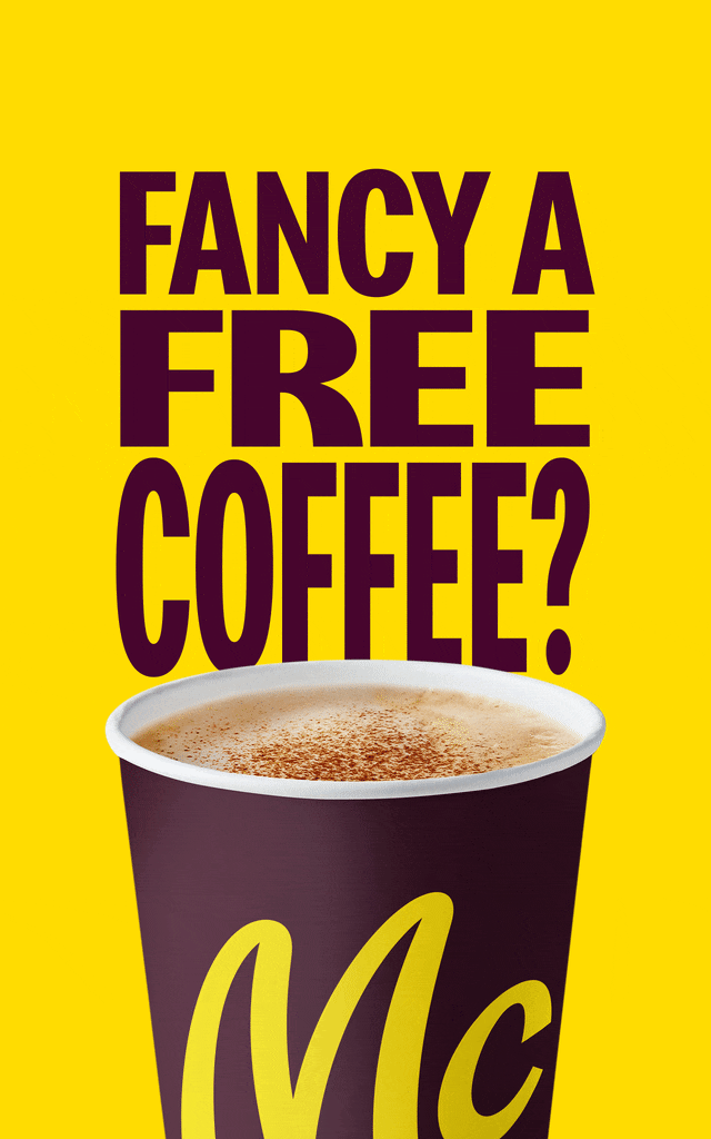 A McCafe coffee. Animated text alongside it reads 'Fancy a free coffee?'.