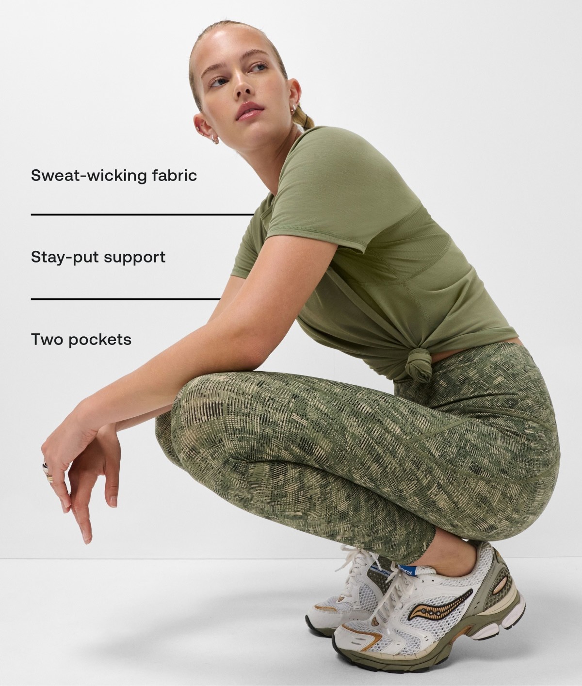 Sweat-wicking fabric Stay-put support Two pockets