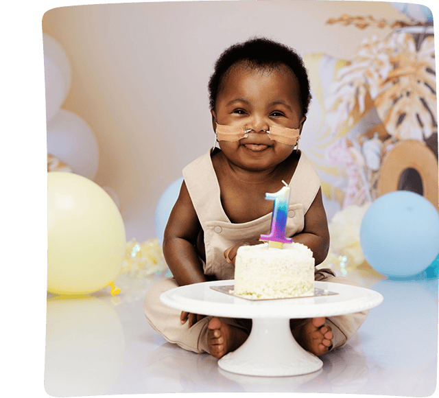 Tobechukwu with a birthday cake