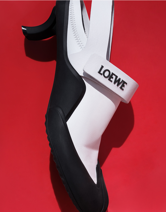 The ‘Dive’ slingback reinvents the kitten heel with a logo strap and rubber accents